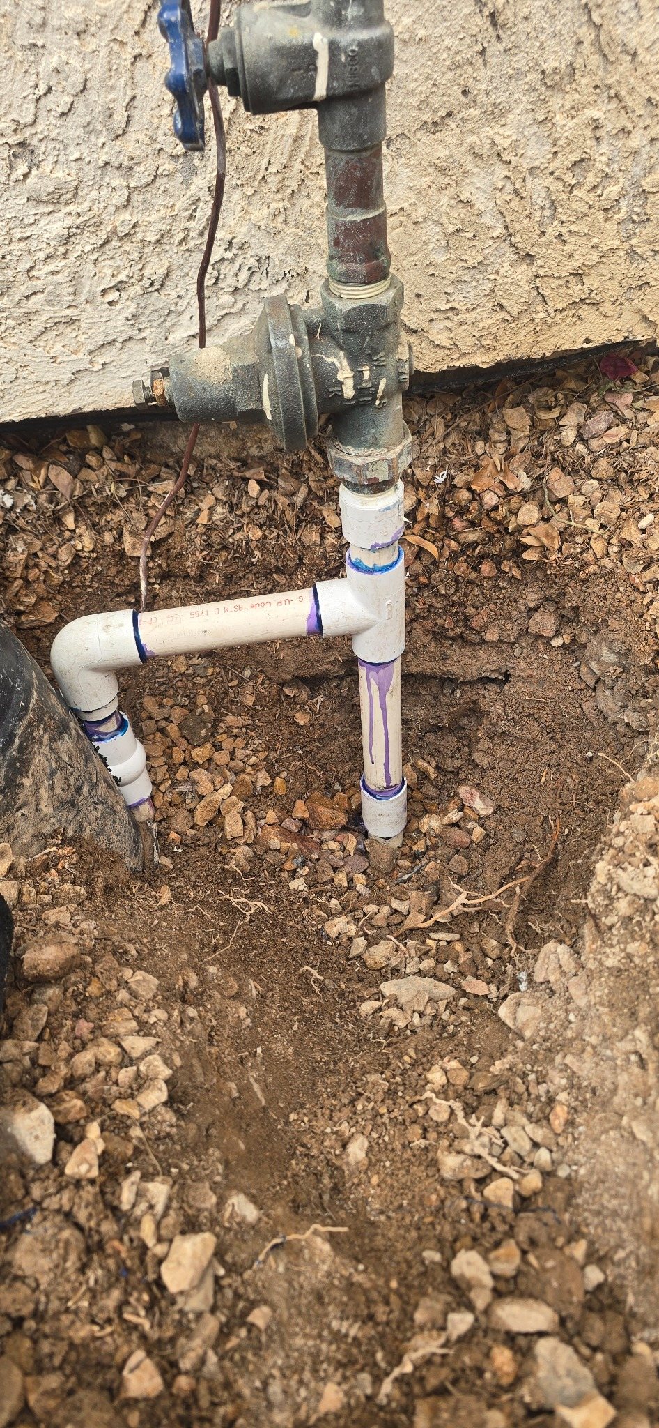 Old pressure regulator and PVC piping